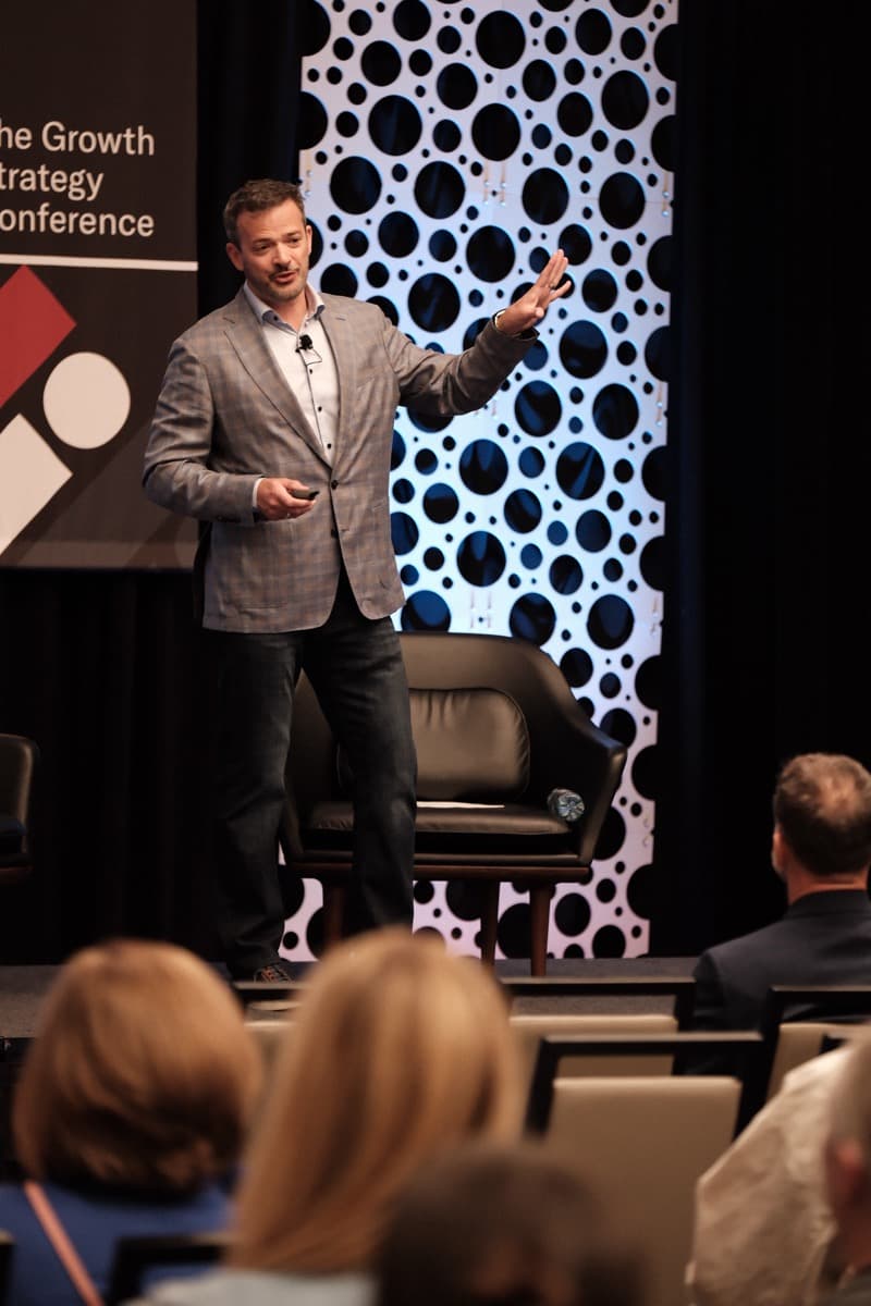 Glenn on stage at the TH!NK Growth Strategy Conference